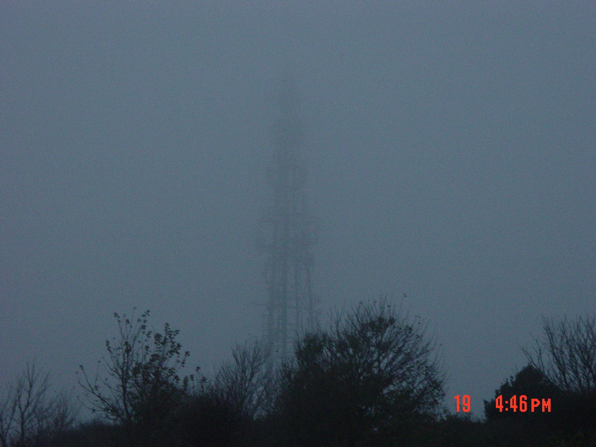 A pylon fading into mist at dusk, taken on a SONY Cyber-shot DSC-P71