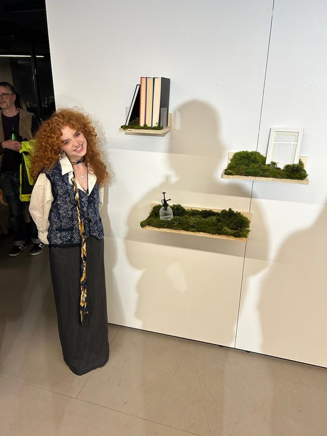 ‘Biophilia’, plywood shelves with moss and books