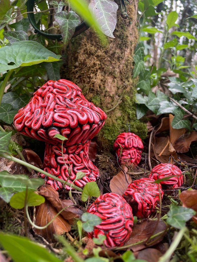 ‘Due Today: Eco-consciousness’, clay sculpture among ivy